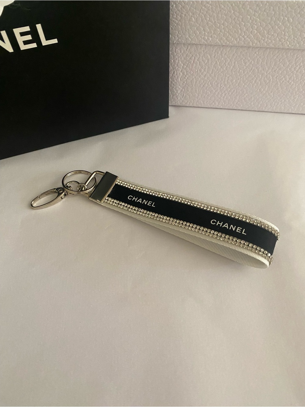 CHANEL Ribbon Black and White Crystal-Trim Key Holder Wristlet